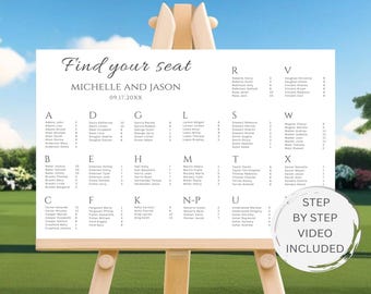 May include: White wedding seating chart with the text "Find your seat" and "Michelle and Jason" with the date "09.17.20XX". The chart is divided into alphabetical sections with guest names listed under each letter. The chart is on an easel with a white background.