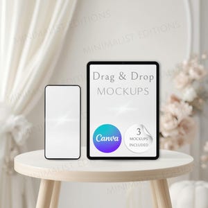 May include: A digital tablet and a smartphone featuring blank white screens. The tablet displays the text Drag & Drop MOCKUPS, a blue and purple Canva logo, and a white circular badge with the text 3 MOCKUPS INCLUDED. The devices are positioned on a light-coloured wooden table.