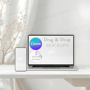 May include: A laptop and smartphone mockup with the Canva logo and the text "Drag & Drop MOCKUPS". The laptop screen displays a white background. A sticker on the laptop says "3 MOCKUPS INCLUDED". The devices are on a white surface.