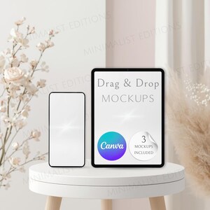 May include: A smartphone and a tablet displayed on a white circular table. The tablet screen features the text Drag & Drop MOCKUPS, a Canva logo, and a circular badge stating 3 MOCKUPS INCLUDED. The devices have blank white screens.