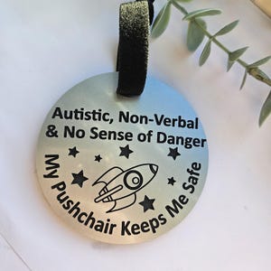 Tag autistico, non verbale e senza senso del pericolo per passeggini e sedie a rotelle per disabili con design a razzo, bisogni speciali, disabilità nascoste