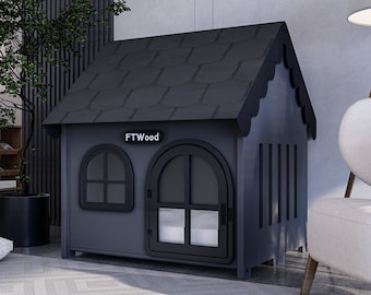 May include: A gray wooden dog house with a black roof and a black door. The dog house has a small window on the side and the text "FTWood" on the front.