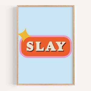 May include: A light blue background with a pink and orange rectangle with the word "SLAY" in white letters. A yellow star is above the rectangle.