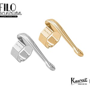 May include: Two pen nib holders, one silver and one gold, are displayed against a white background. The silver holder is on the left, and the gold one is on the right. The Kaweco logo is at the bottom right, and the text "FILO fascination" is at the top left.