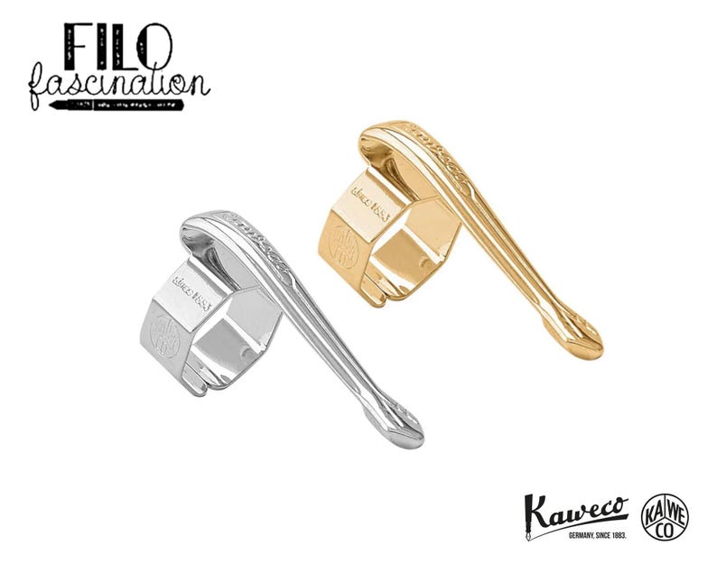 May include: Two pen nib holders, one silver and one gold, are displayed against a white background. The silver holder is on the left, and the gold one is on the right. The Kaweco logo is at the bottom right, and the text "FILO fascination" is at the top left.