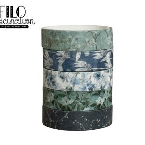 May include: A stack of decorative washi tape rolls with floral patterns in shades of blue, green, and white. The text "FILO fascination" is printed in black script at the top left.
