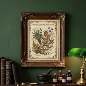 May include: A framed print titled "Magical Cooking Ingredients" features illustrations of herbs, mushrooms, garlic, and wooden spoons. The artwork is in a decorative brown frame, displayed against a dark green wall. The print includes text such as "Foraged Herbs" and "Wild Mushrooms".