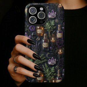May include: A black smartphone case featuring a repeating pattern of glass potion bottles labeled Nightshade, Wolf's Bane, and Witch's Brew, interspersed with purple crystals, black roses, lit candles, green herbs, and silver crescent moon charms.
