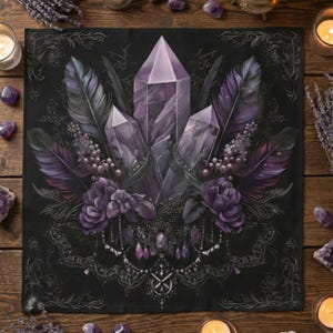 May include: A black square textile featuring a central design of purple crystals, feathers, and flowers. The crystals are the focal point, with intricate details and shading. The design is framed by a decorative border, creating a mystical and artistic aesthetic.