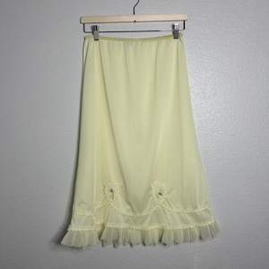 Vintage 1960s Starflower Nylon Half-Slip Skirt - Soft Yellow with Embroidered Floral Details and Pleated Hem