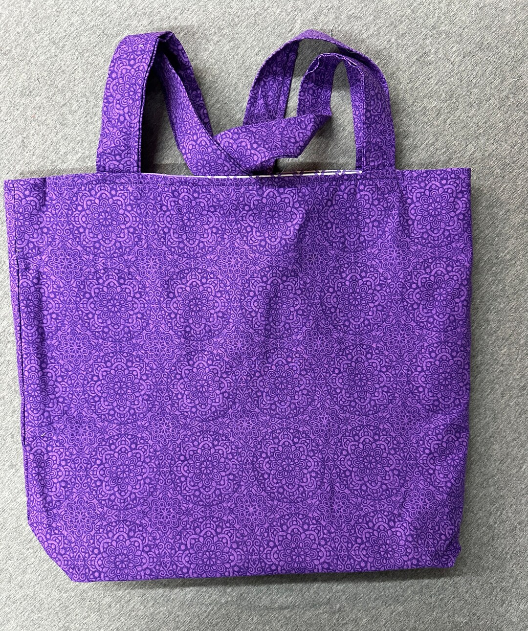 Purple and burgundy large tote bag with inside pocket. main image 1