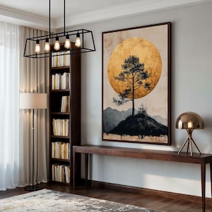 a living room with a couch and a painting on the wall