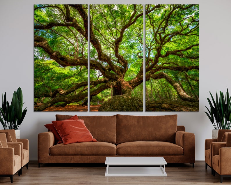 a living room scene with a couch and a large tree