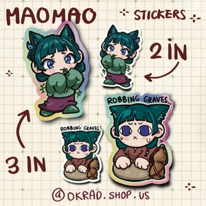 May include: Three sticker designs featuring a cartoon character with green hair and cat ears. The character is wearing different outfits in each design. The stickers are available in 2 inch and 3 inch sizes. The text "Robbing Graves" is included in two of the designs.