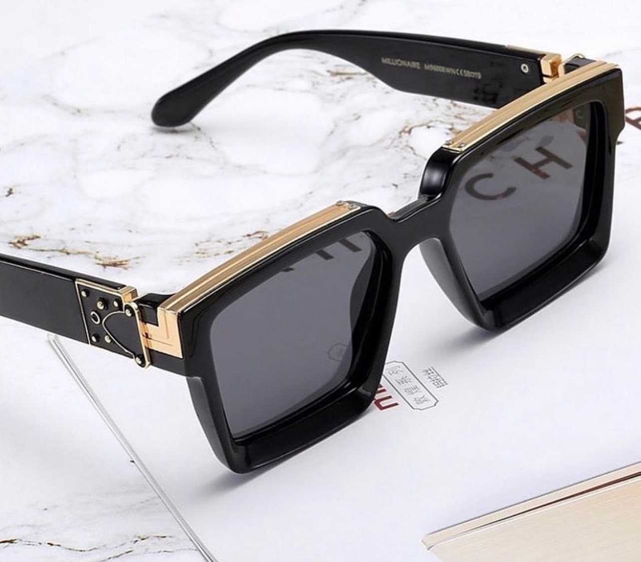 Zonnebril Louis Vuitton zwart in Metaal - 44149514