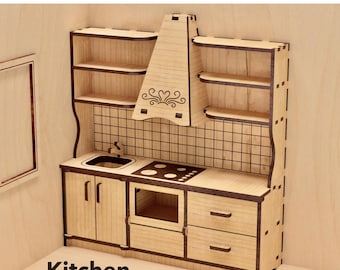 May include: A wooden dollhouse miniature kitchen with a stove, sink, cabinets, and shelves. The kitchen is made of light brown wood and has a tiled backsplash. The text "Kitchen" is printed below the miniature.