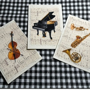 Tarjetas en blanco, para todas las ocasiones, con temática musical, con partituras de tela e instrumentos de tela. Cumpleaños, felicidades, que te mejores, gracias.