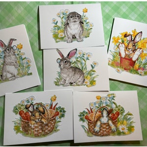 Niedliche,selbstgemachte Osterkarten mit handgeschnittenen Stoffhasen. Für Kinder und Erwachsene. Hasen in Körben. Brillenhasen.