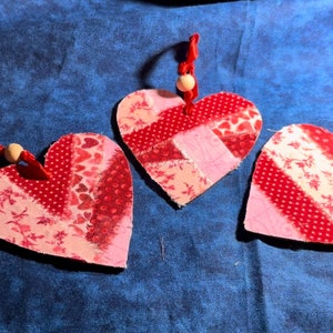 Shabby Valentines hanging hearts. Fabric on wood with ribbon hangers with beads.  Valentines decor.  3 inch.  Valentines ornaments.