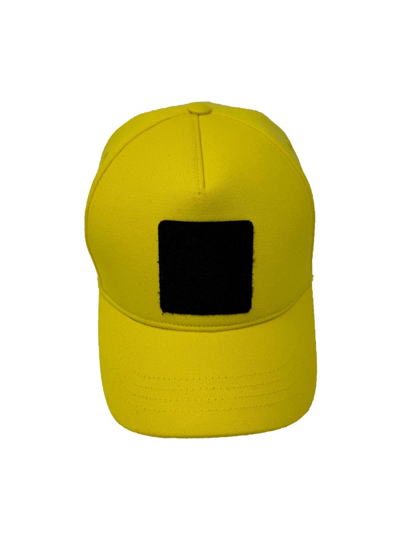 Yellow cotton 5 panel cap with Velcro patch area for removable designs, breathable and lightweight.