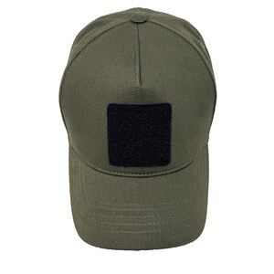 Khaki green 5 panel cotton hat with front hook and loop patch panel, adjustable fit and breathable comfort.