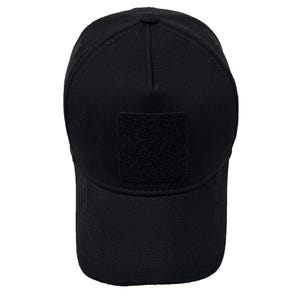Black 5 panel cotton hat with hook and loop front patch panel, breathable and adjustable fit.