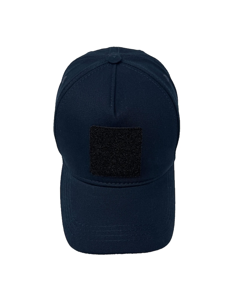 Dark blue cotton 5 panel cap featuring a front Velcro patch panel, breathable and stylish.