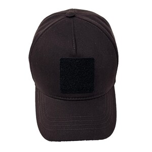 Brown 5 panel cotton hat featuring front hook and loop patch area, breathable and durable.