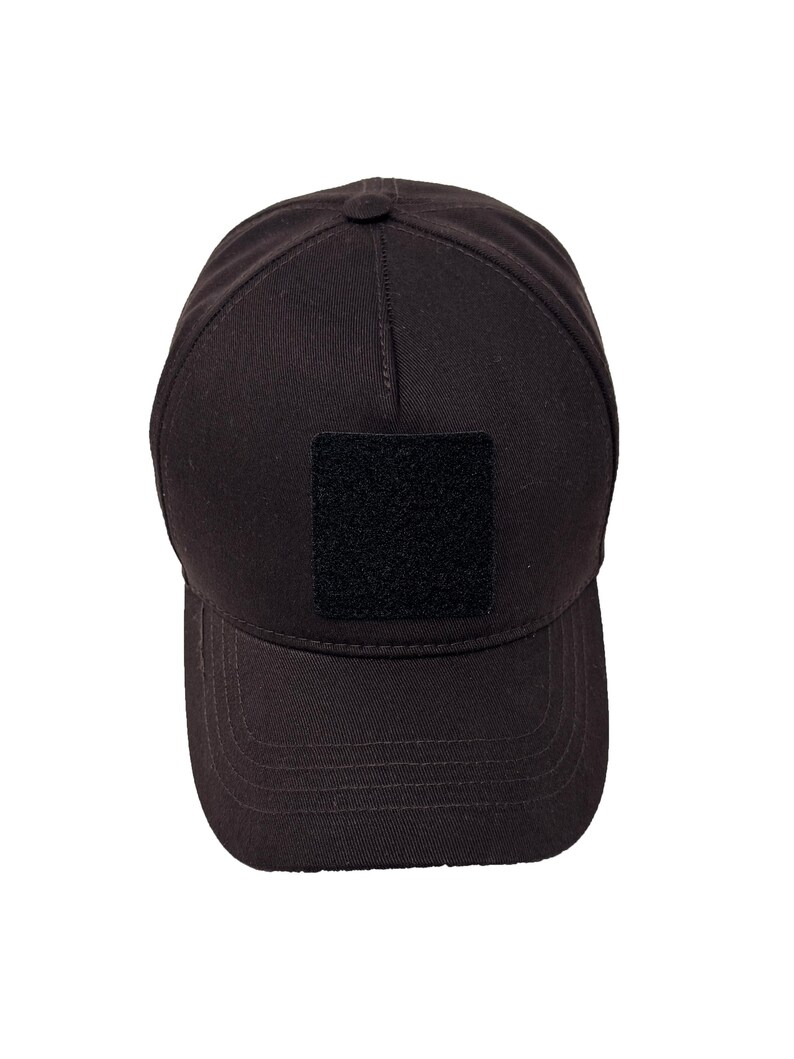 Brown 5 panel cotton hat featuring front hook and loop patch area, breathable and durable.