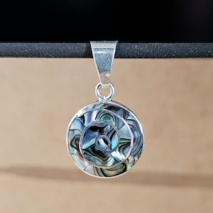 Pachamama pendant in 950 silver with stone inlays, Peruvian crafts, pendant of different precious stones.