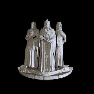 May include: A white sculpture depicting three robed figures with long beards and crowns, set against a black backdrop. The central figure holds a scroll, the others hold objects, all on a stone base.