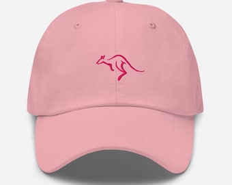 May include: A light pink baseball cap featuring a red kangaroo outline on the front. The cap has a curved brim and an adjustable strap at the back. This hat is a stylish accessory for casual wear.