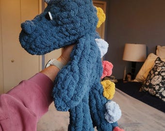 Grobstrick Dinosaurier Snuggler