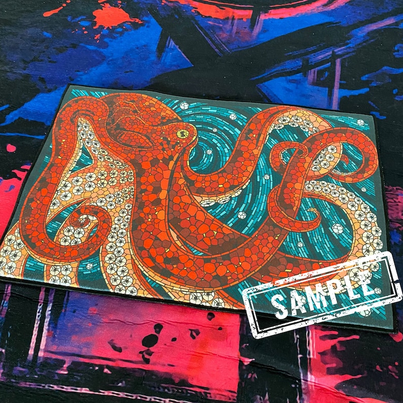 May include: A colorful octopus with a mosaic design in shades of red, orange, and blue. The octopus is on a black background with a white sample label.