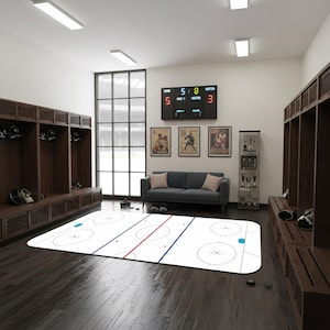 May include: A hockey-themed room with dark wood flooring, wooden lockers, and a blue sofa. A large rug depicts a hockey rink. A scoreboard displays the score. Vintage hockey posters and a glass display case add to the decor.