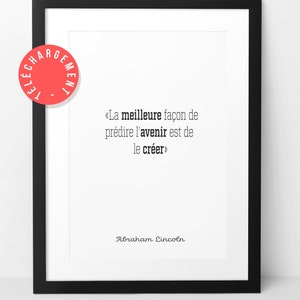 May include: A black framed print with a white background and a quote in French by Abraham Lincoln: "La meilleure façon de prédire l'avenir est de le créer."