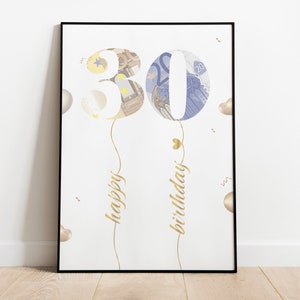 May include: A white card with the number 30 in gold lettering, made to look like balloons. The balloons are filled with a blue and white pattern that resembles money. The words "happy birthday" are written in gold script below the balloons.