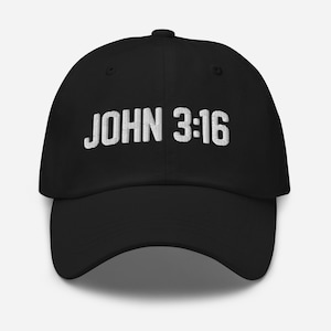 May include: Black baseball cap with the text "JOHN 3:16" embroidered in white. The cap has a curved brim and an adjustable strap at the back. The hat is made of a soft, durable material.