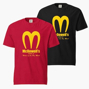 McDowell’s – Premium Unisex Heavyweight T-Shirt – Coming to America Movie Inspired Tee