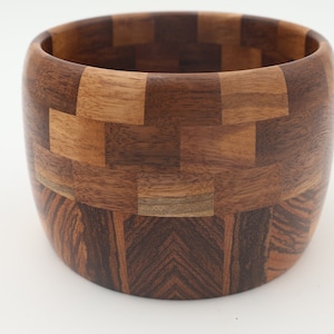 A Walnut and Zebra Wood Woodturned Segmented Bowl