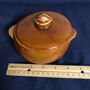 Vintage MCCOY USA Lidded Brown Ceramic Vegetable Dish Bean Pot EUC. Petite McCoy stoneware pot. 5.5 in wide handle to handle.2 small chips