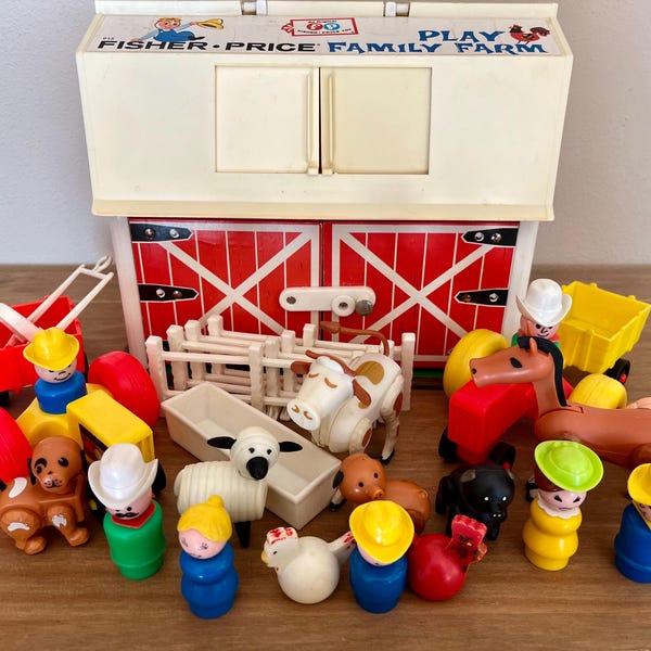May include: A Fisher-Price Play Family Farm playset featuring a white and red barn with a loft, accompanied by various plastic figures including a cow, sheep, horse, dog, pig, chicken, several people in hats, a red tractor, and a yellow wagon.