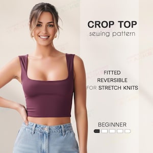 May include: A plum-coloured crop top with a square neckline. The image includes text that reads "CROP TOP sewing pattern" and details about the pattern, including "FITTED REVERSIBLE FOR STRETCH KNITS" and "BEGINNER".