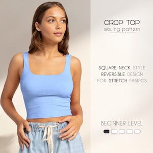 May include: A light blue crop top sewing pattern with a square neck style. The pattern is reversible and designed for stretch fabrics. The pattern is beginner level.