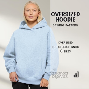 May include: A pale blue oversized hoodie sewing pattern. The pattern is designed for stretch knits and offers 8 sizes. The image text indicates it is for advanced beginners.