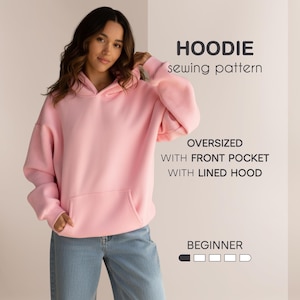 May include: A pale pink oversized hoodie with a front pocket and lined hood. The image text reads "HOODIE sewing pattern" and "OVERSIZED WITH FRONT POCKET WITH LINED HOOD". The difficulty level is marked as beginner.