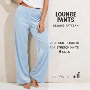 May include: Light blue lounge pants with a wide leg design. The pants are made of a soft material and have a comfortable elastic waistband. The image includes text that reads "LOUNGE PANTS SEWING PATTERN" and "WITH SIDE POCKETS FOR STRETCH KNITS 8 SIZES".