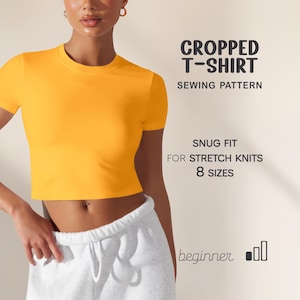 May include: A cropped, short-sleeved, yellow t-shirt. The shirt is paired with gray sweatpants. Text on the right side of the image reads "CROPPED T-SHIRT SEWING PATTERN", "SNUG FIT FOR STRETCH KNITS 8 SIZES", and "beginner".