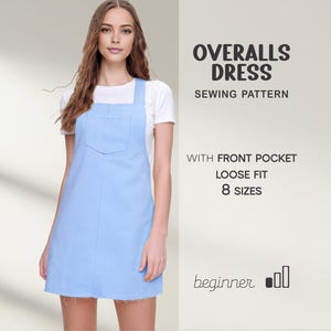 May include: A light blue overalls dress with a front pocket and a loose fit. The dress is worn over a white t-shirt. The image includes text that reads "OVERALLS DRESS SEWING PATTERN" and "8 SIZES".