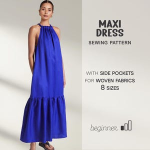 May include: A striking blue maxi dress with a halter neck and a frilled hem. The image includes text that reads "MAXI DRESS SEWING PATTERN" and "WITH SIDE POCKETS FOR WOVEN FABRICS 8 SIZES". The dress is designed for beginners.